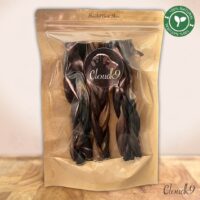 Pack of 3 Cloud K9 braided goat skins long lasting dog chews on wooden board